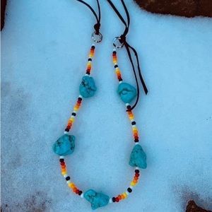 Beautiful handcrafted Turqurenite and black leather necklace